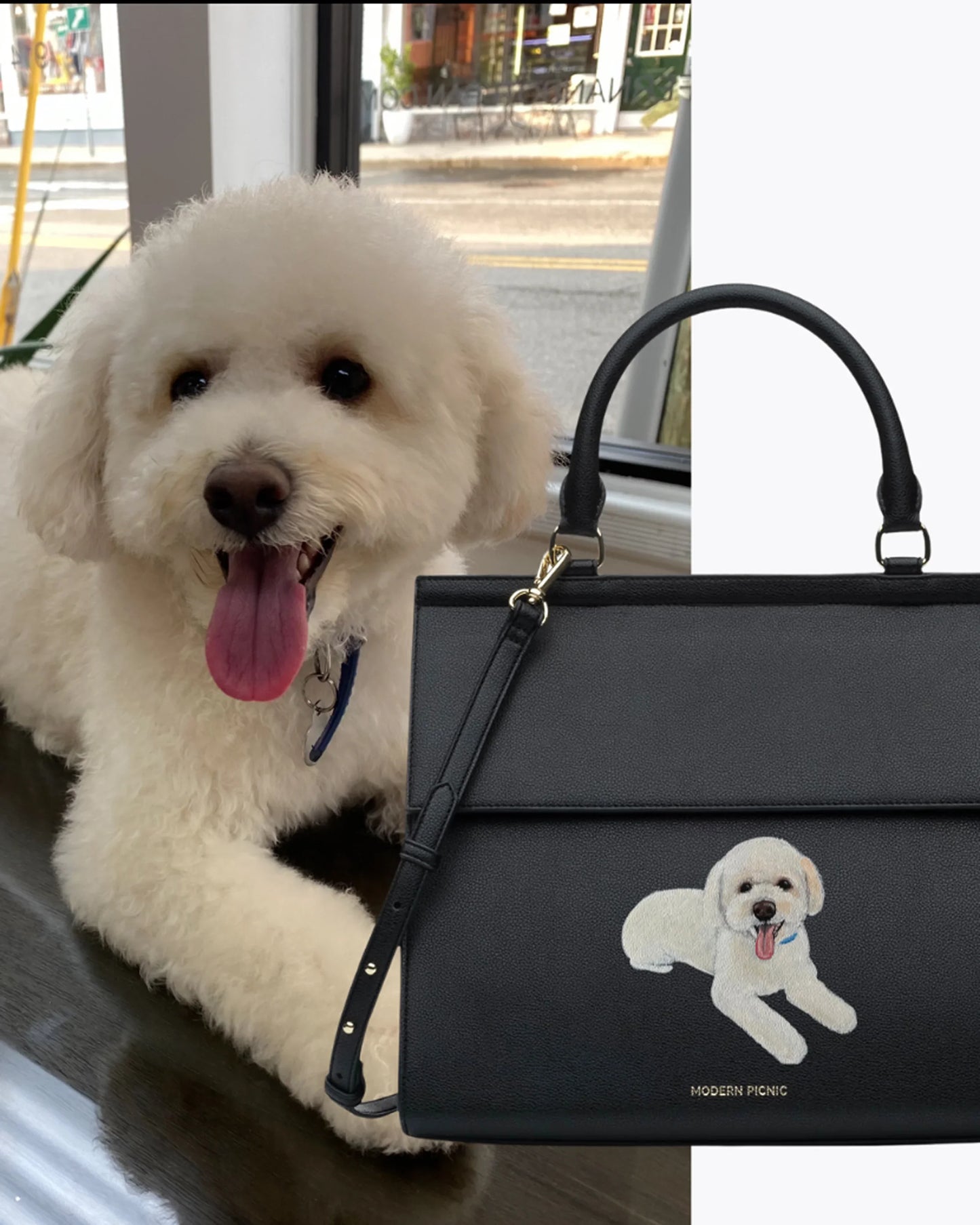 Fluffy white dog next to black vegan leather lunch tote with embroidered dog design