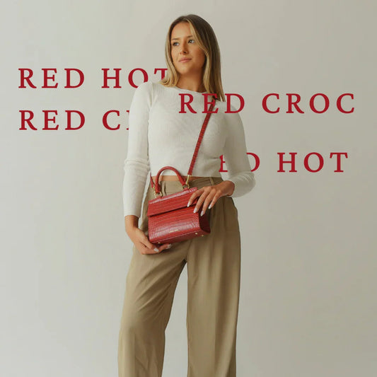 Red croc-embossed vegan leather crossbody bag with top handle, styled for work or everyday use
