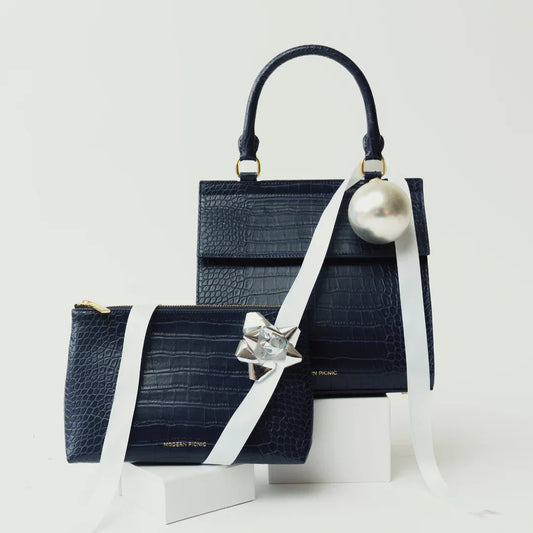 Navy croc-texture vegan leather tote & pouch set with white ribbon, perfect for chic work or travel style