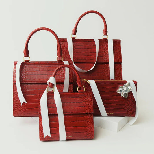 Set of red vegan leather crocodile lunch bags and totes with gift ribbons and bows