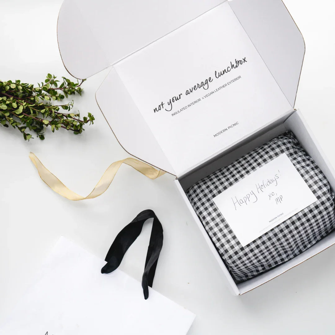 Stylish black and white gingham insulated lunch bag in gift box with holiday card, vegan leather exterior
