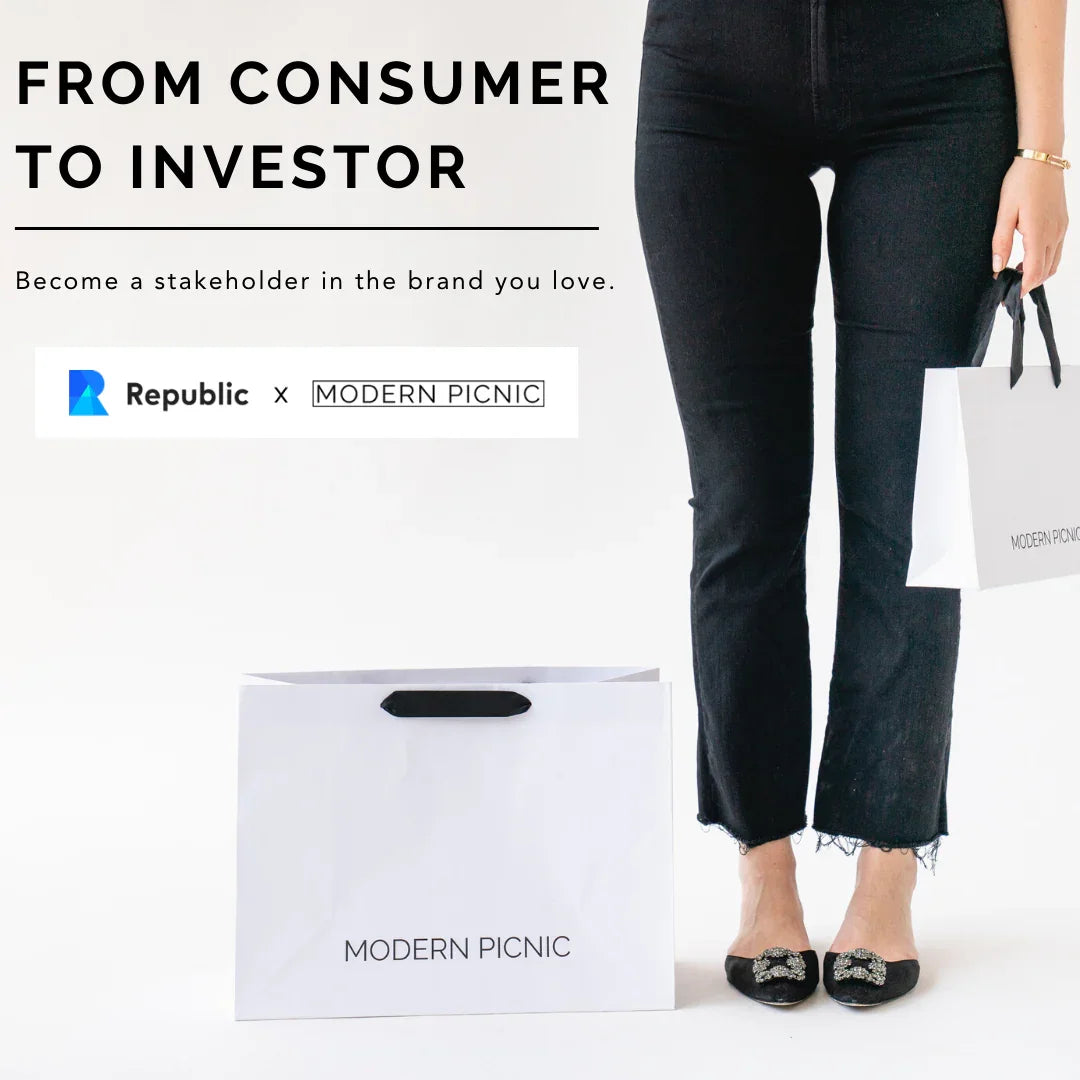 Woman holding Modern Picnic branded shopping bags, promoting consumer to investor opportunity with Republic