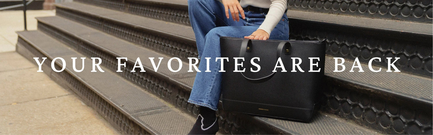 Woman with black vegan leather tote bag sitting on outdoor steps, stylish insulated purse