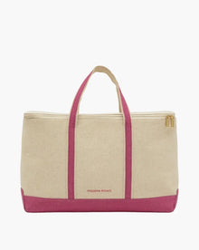 Chic insulated lunch tote with pink handles and base, gold zipper, and canvas body