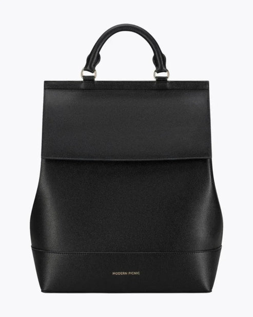 cool leather backpack on bed Roosevelt Laptop Messenger Bag Where craftsmanship meets confidence Bowery Leather Laptop Backpack, Grizzly