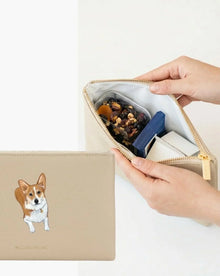 Beige vegan leather lunch bag with corgi design, open to reveal snacks and insulated interior.