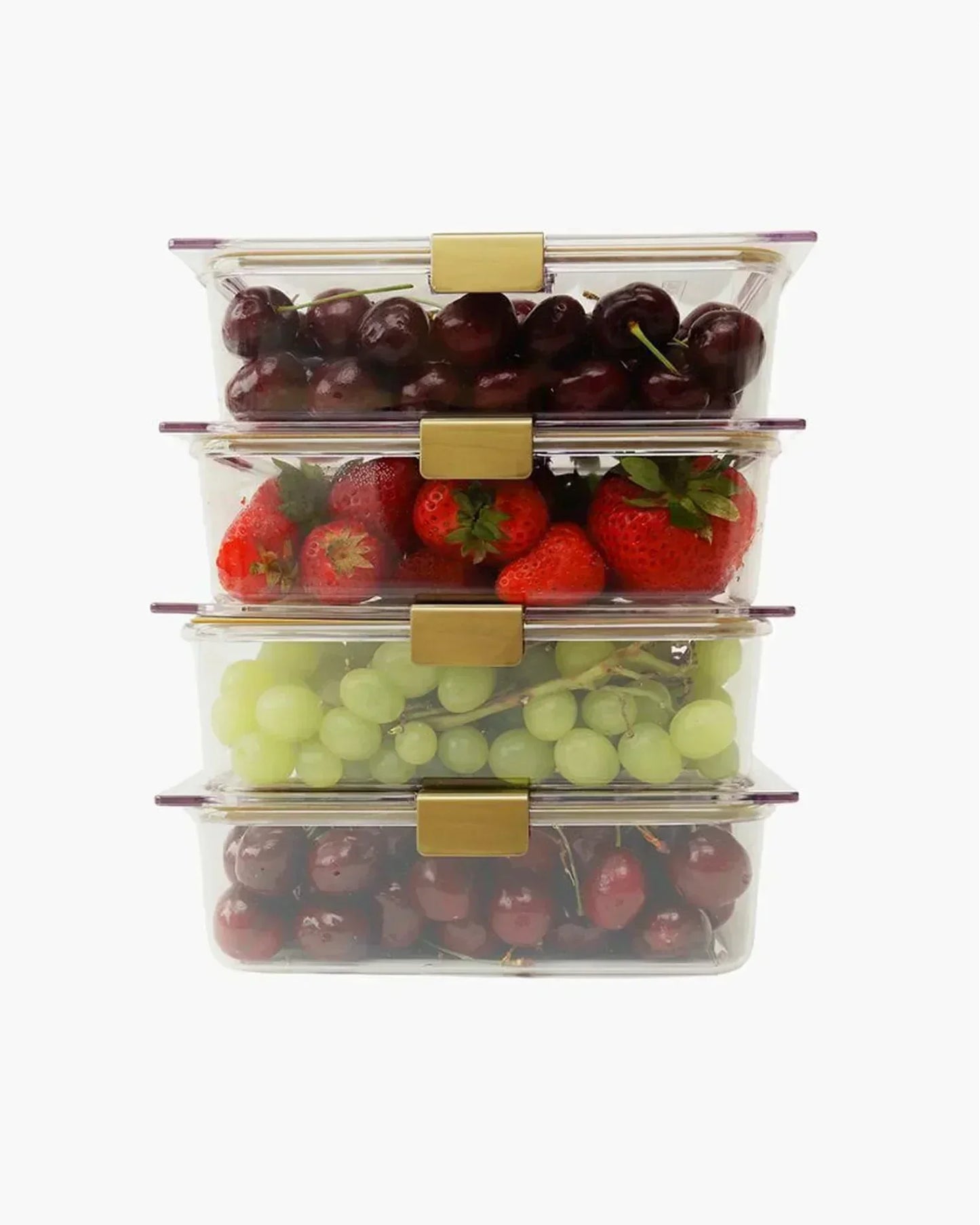 Stack of clear food containers with grapes, cherries, and strawberries for lunch storage