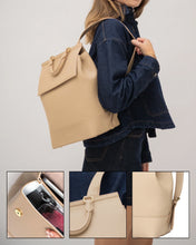 Woman in denim outfit carrying beige vegan leather insulated backpack with gold hardware, detailed close-ups of the bag.