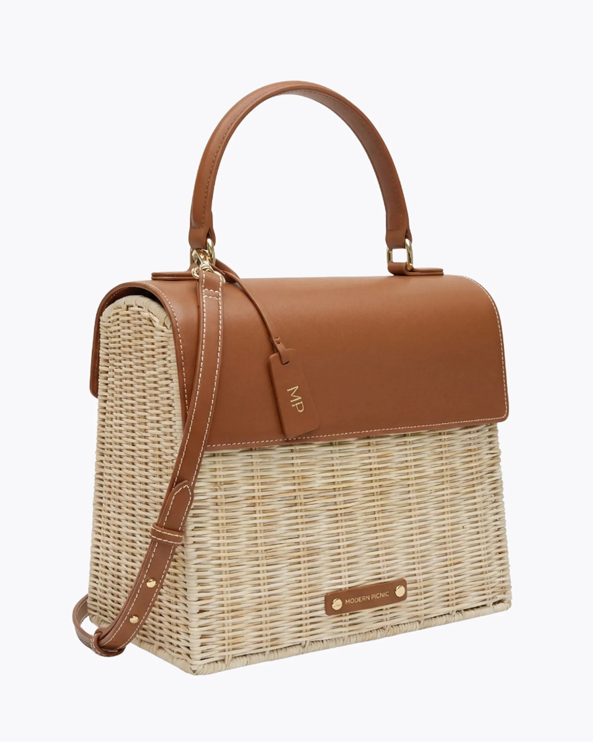 Woven wicker lunch tote with tan vegan leather top, handle, and strap — chic insulated bag for work or picnics