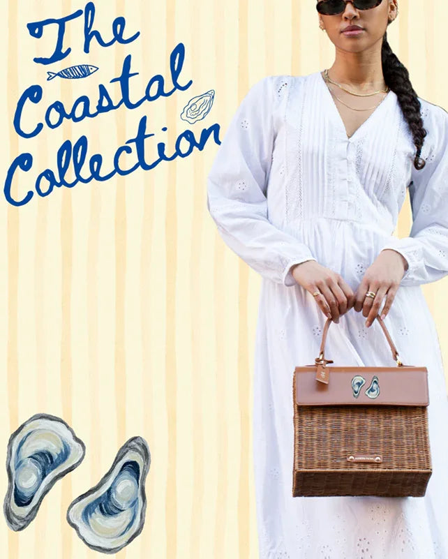 Coastal Collection wicker tote with vegan leather accents, styled with white dress for chic beach outings.