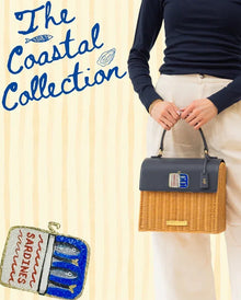 Coastal Collection wicker tote with navy top, styled for chic everyday use