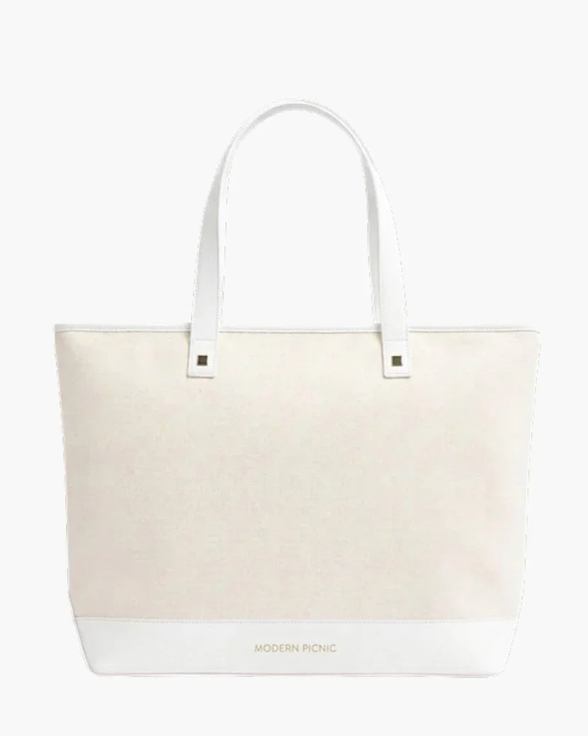 Cream canvas tote with white vegan leather handles and base, branded Modern Picnic for stylish everyday use