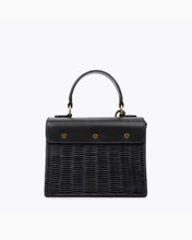 Chic black wicker mini handbag with vegan leather flap and top handle, featuring gold hardware – stylish insulated lunch bag by Modern Picnic.