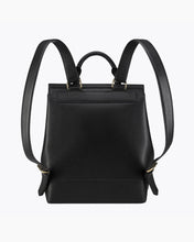 Rear view of the black Modern Picnic The Backpack in vegan leather. The image clearly shows the adjustable black shoulder straps connected by gold-tone hardware, a small top handle, and the structured back panel.