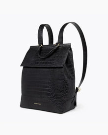 Angled view of the black crocodile-embossed insulated backpack with adjustable shoulder straps and top carry handle on a white background.