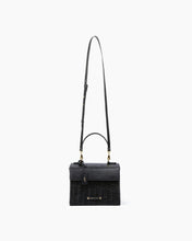 Elegant black wicker mini crossbody lunchbox with vegan leather flap, gold hardware, top handle, and adjustable shoulder strap – insulated and chic everyday bag by Modern Picnic.
