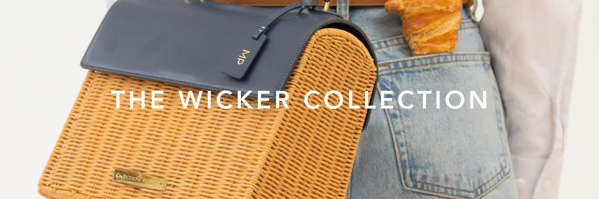 Wicker lunch tote with navy vegan leather flap, stylish for work or travel