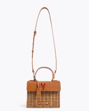 The Wicker Mini in Brown Wicker Lobster by Modern Picnic shown with full-length adjustable crossbody strap, featuring a hand-woven wicker body and brown vegan leather flap with printed lobster on a white background.