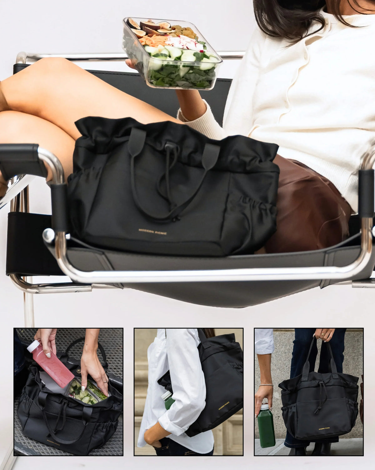 A woman holding a clear container of salad next to a black Modern Picnic insulated lunch tote bag.