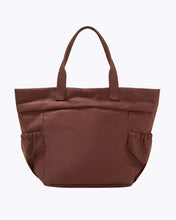 Brown lunchbox on a white background cobranded with FabFitFun