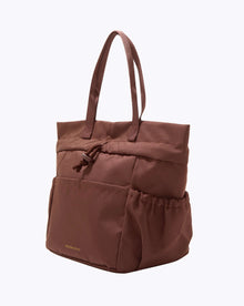 Brown tote bag on a white background cobranded with FabFitFun lunchbox