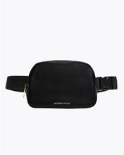 Face on view of a black vegan leather fanny pack with an adjustable strap and gold zip closure.