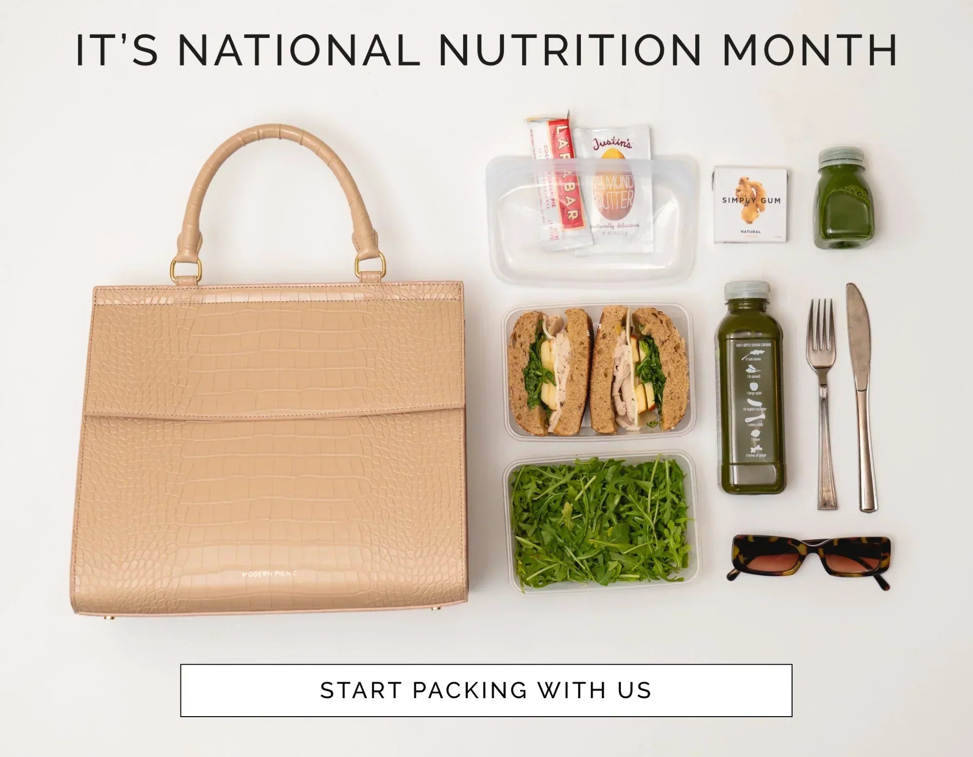 Beige croc-texture lunch tote with packed healthy meal, greens, juice, and snacks for National Nutrition Month