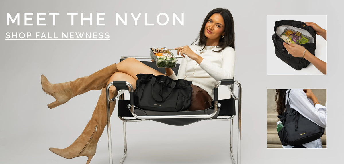Woman sitting in a chair with a black nylon lunch bag and a meal container.