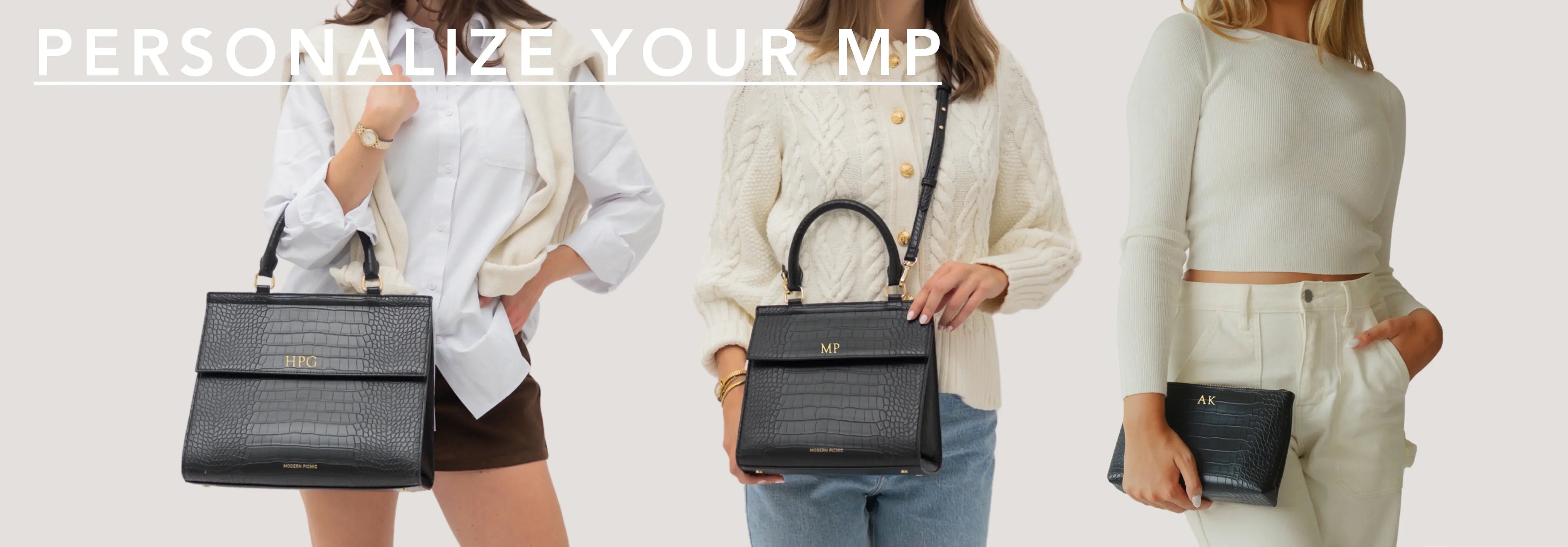 Stylish black croc-textured tote bags with gold initials, perfect for work or travel