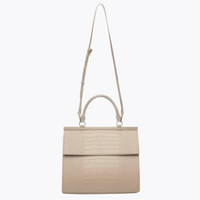 Cream vegan leather lunch bag with croc-embossed texture and adjustable long strap