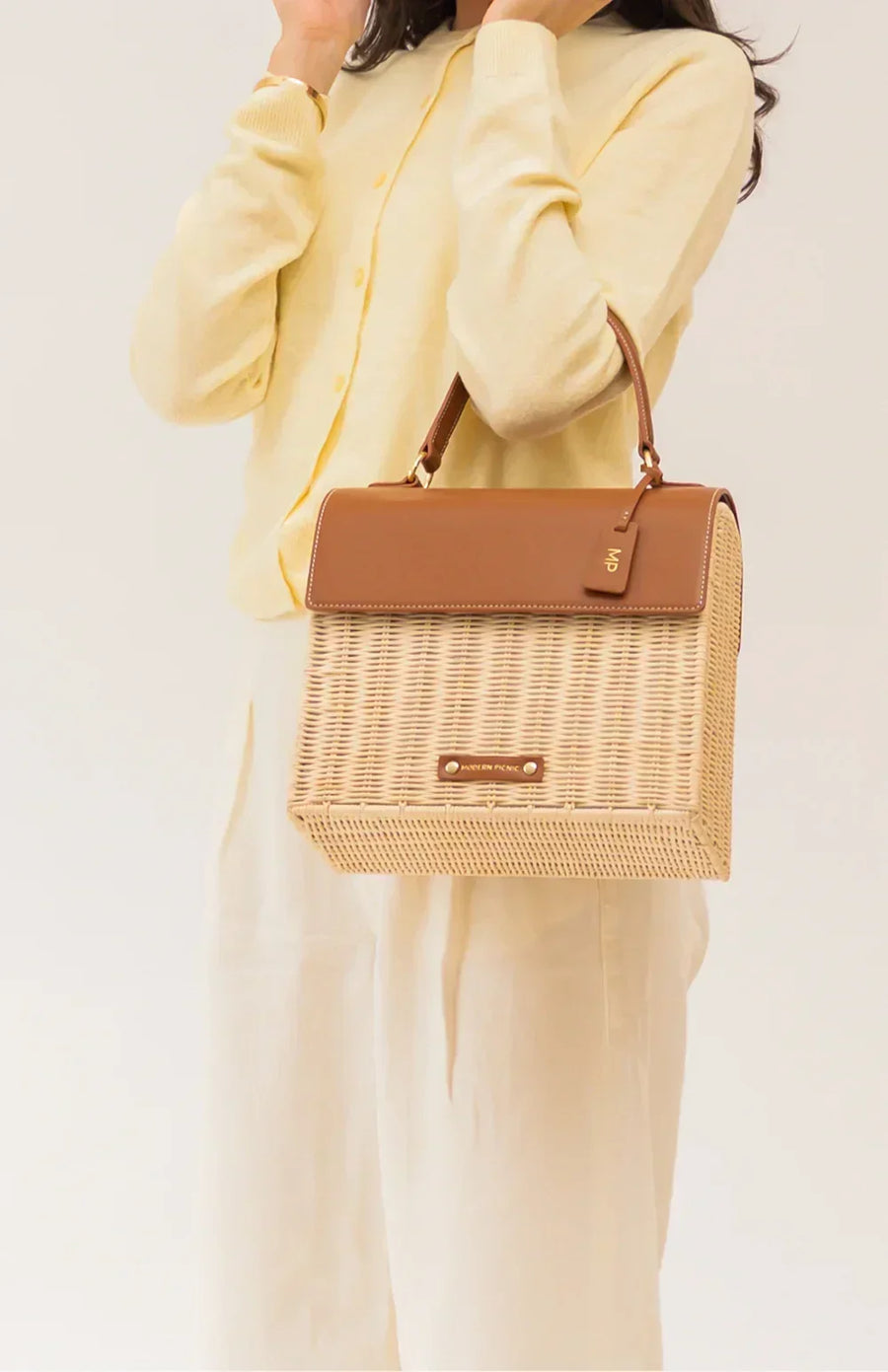 Stylish woven lunch tote with vegan leather accents, perfect for work or travel