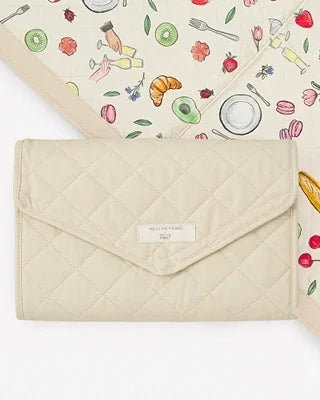 Cream quilted insulated lunch bag with floral picnic print, perfect for work or travel