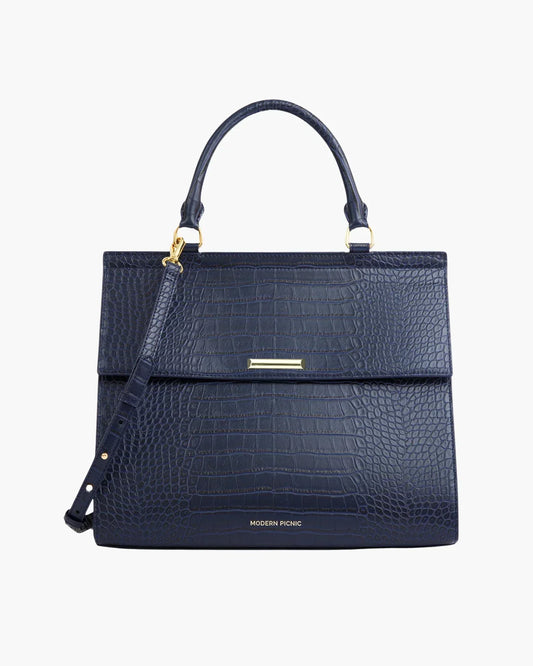 Navy blue vegan leather croc-embossed insulated lunch bag with gold hardware and top handle.