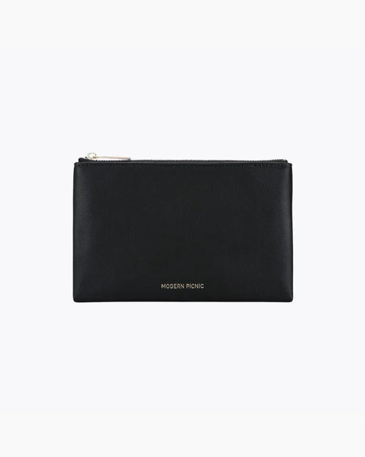 A front-facing studio shot of a small, rectangular black pouch. The bag is made of pebbled vegan leather and features a gold zipper along the top. The gold "MODERN PICNIC" logo is subtly stamped near the bottom center.