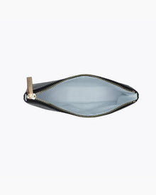 An overhead view of a small black zippered pouch held fully open, revealing the empty white insulated interior lining and a gold zipper with a large pull tab.