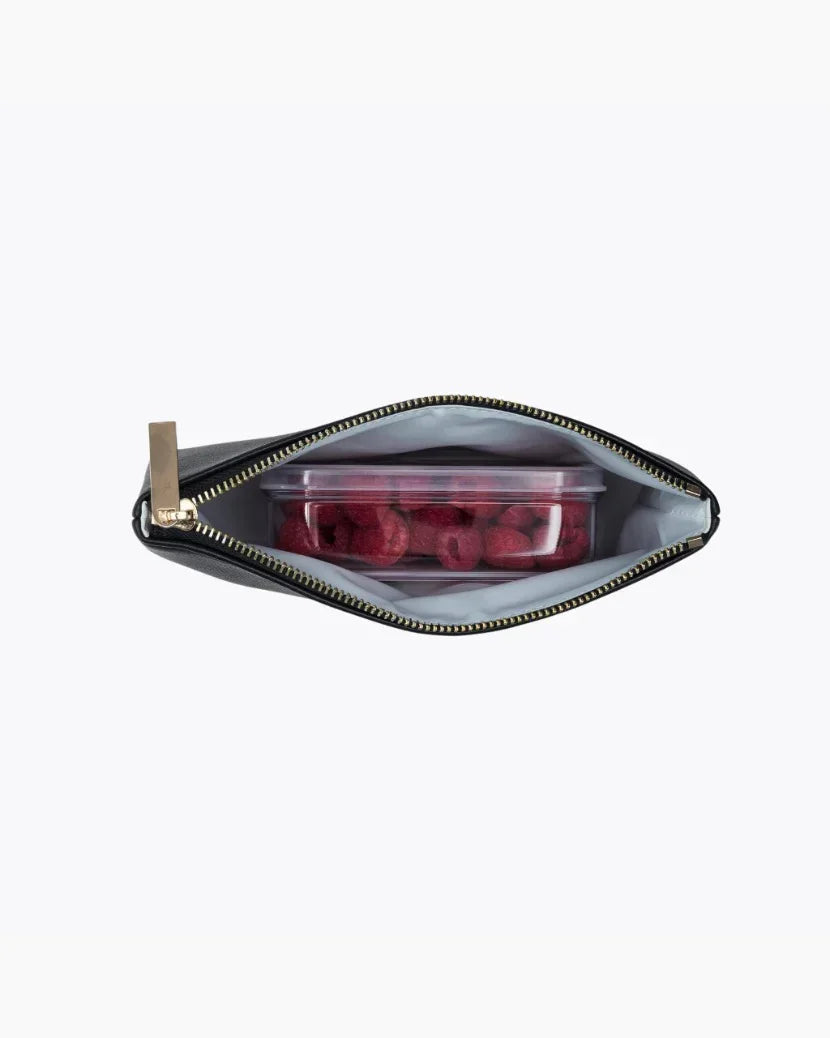 An overhead view of a small black zippered pouch with the zipper open, revealing the white insulated interior holding a clear, rectangular container full of fresh red raspberries.