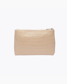 A back-facing studio shot of a rectangular cream pouch made of crocodile-embossed vegan leather, featuring a gold zipper closure at the top.