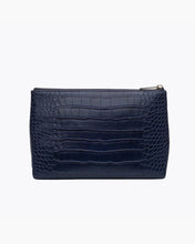 A back-facing studio shot of a rectangular navy blue pouch made of crocodile-embossed vegan leather, featuring a gold zipper closure at the top.