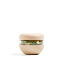 Beige airtight food storage container with salad, minimalist design on white background
