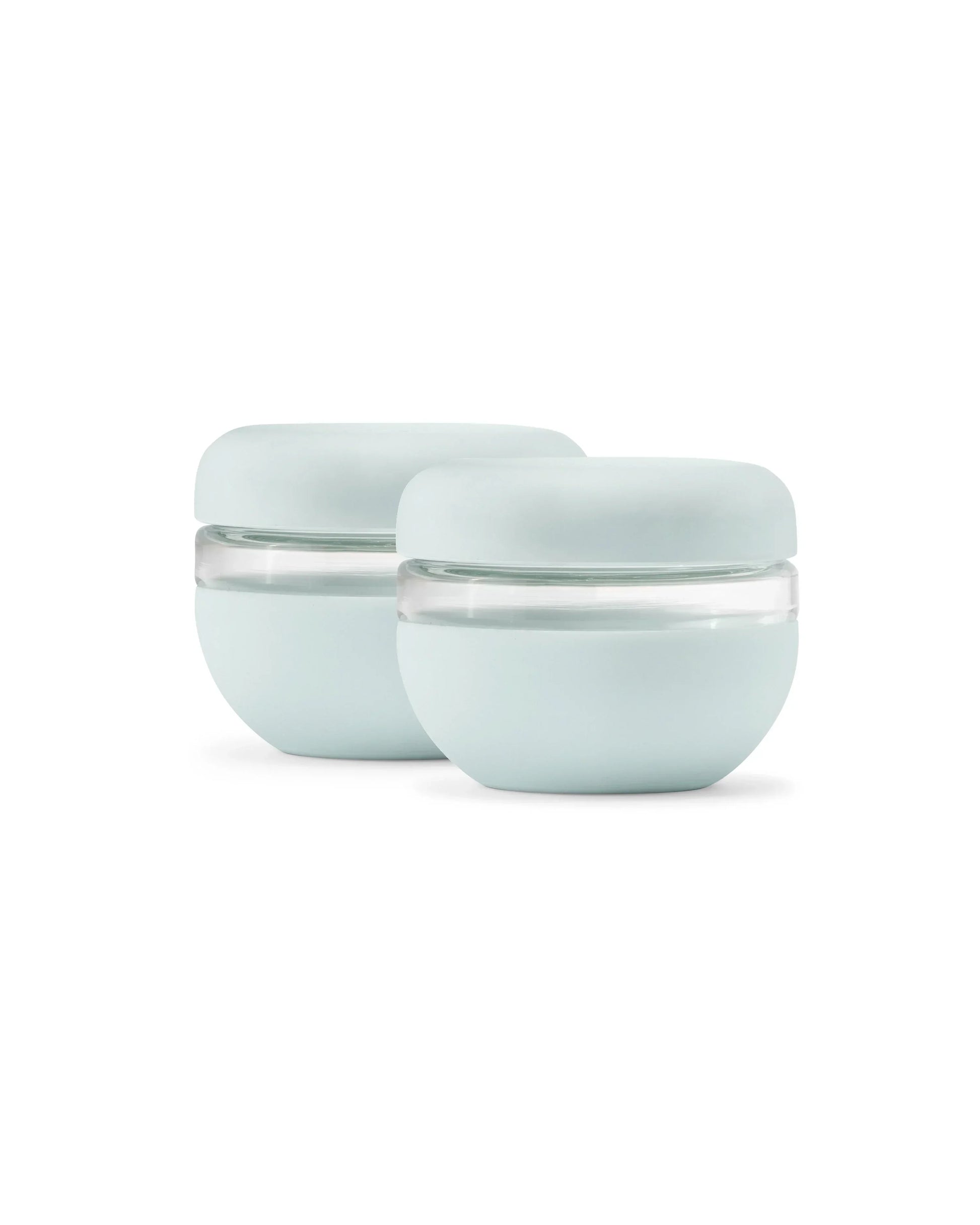 Set of two mint green airtight glass food storage bowls with silicone lids
