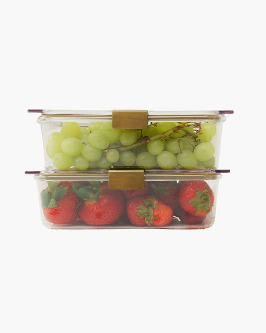 Stacked glass food containers with green grapes and strawberries, insulated lunch storage