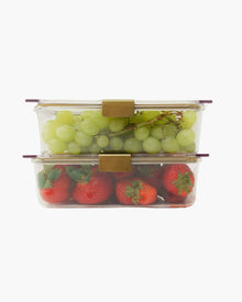 Stacked glass food containers with green grapes and strawberries, insulated lunch storage