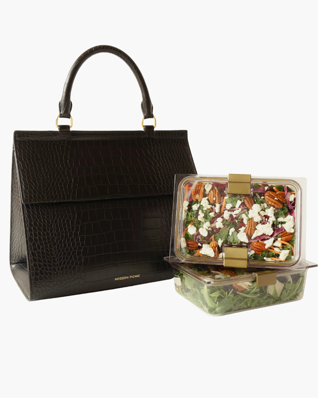 Black large luncher bag with two reusable food containers filled with salad and fruit