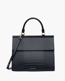 The Large Luncher in Black Croc vegan leather shown from the front with detachable strap. 