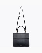 The Large Luncher - Black Croc with removable crossbody strap attached.