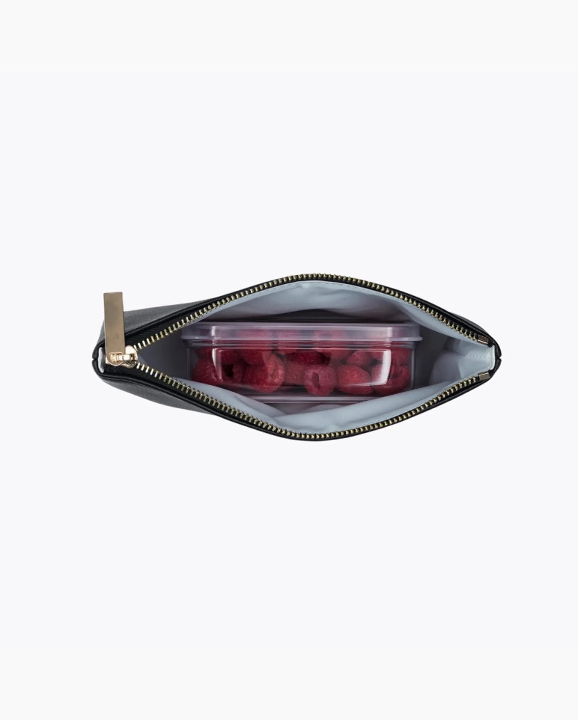 Open black Snacker pouch showing the insulated, wipe-clean interior and gold zipper hardware.	