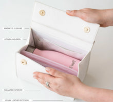 Modern Picnic cream croc bag from the Mommy and Me Set opened to reveal its pink insulated interior.