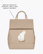 Cream Modern Picnic backpack featuring custom hand-painted white cat portrait on front.