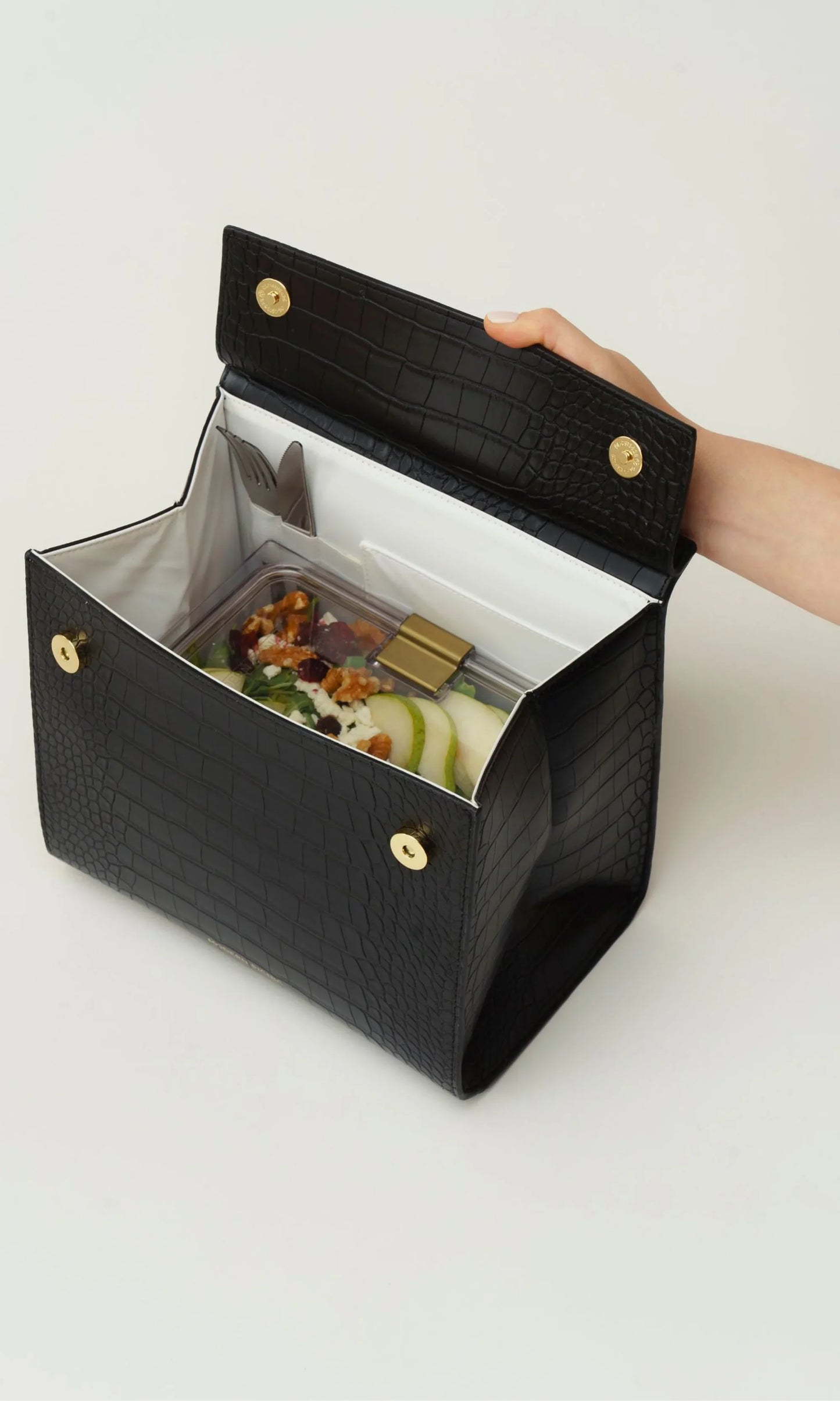 Interior of the Modern Picnic black handbag from THE ORIGINALS SET, showing spacious insulated compartment for meals.