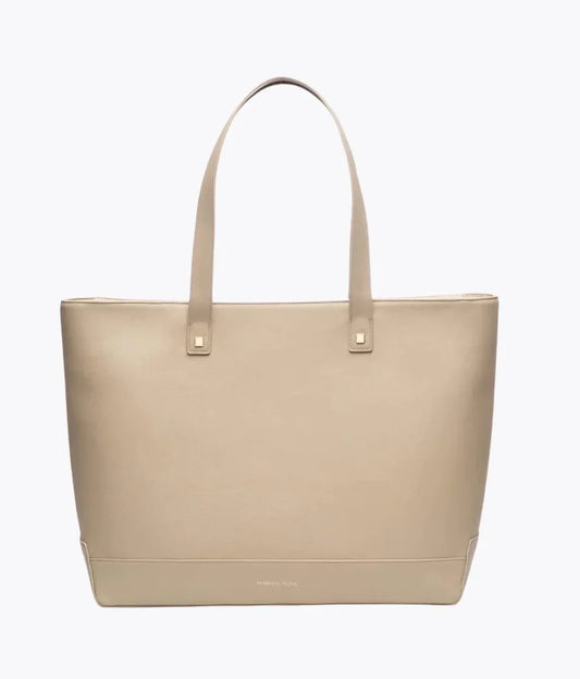 Beige vegan leather tote bag with long shoulder straps for work or travel.